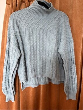 Cozy Light Blue Cable-Knit Turtleneck Sweater